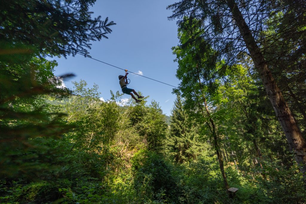 Visitors enjoying the new zipline course at Organic Adventure Park in Switzerland.
